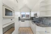 04_Küche - Exklusive 3.5-Zimmer-Dachwohnung mit Wintergarten – Modernes Wohnen in Baar (ZG)